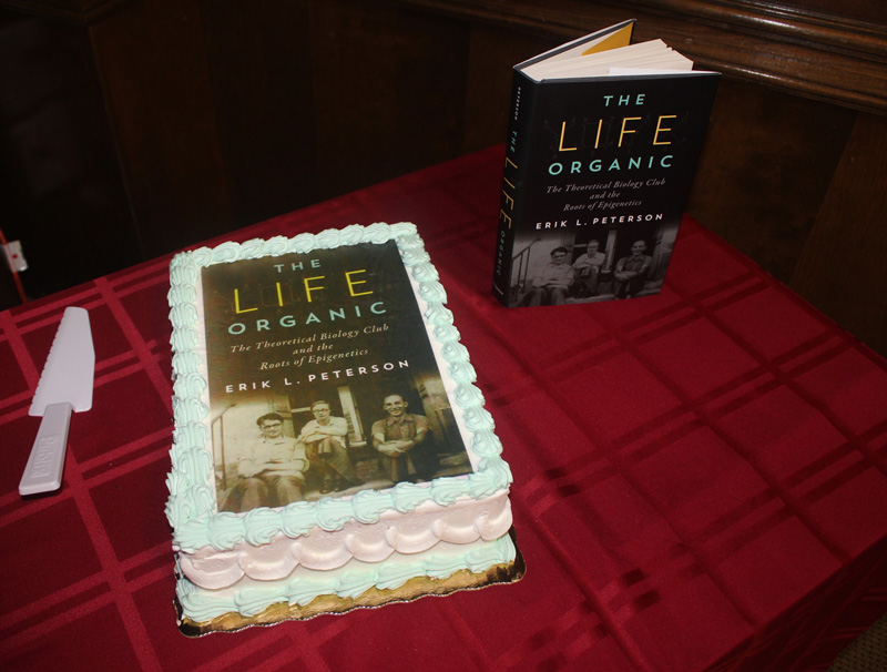 This is a photo of Dr. Peterson's"book cake," a tradition in the department where we have a cake with icing on it that looks like the book cover.