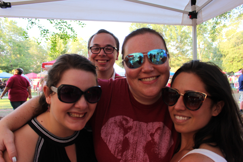 This image shows graduate students enjoying the tailgate.