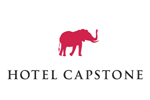 Hotel Capstone logo - crimson elephant above the words Hotel Capstone.