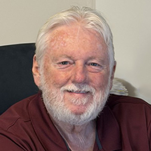 Profile image of Jeff Davis. He has white hair, a white beard, and is wearing a maroon shirt.
