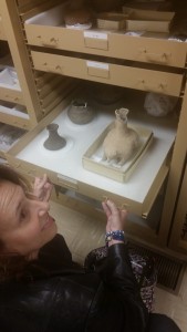 An attendee examines items in the Moundville Archeological Park's Special Collections holdings.
