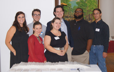 This image shows the UA graduate students who organized and hosted the event, along with the keynote speaker. 