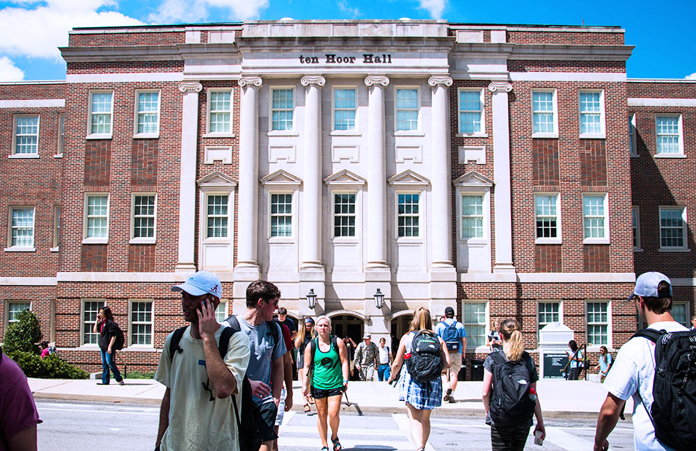 students walking in front of ten Hoor Hall