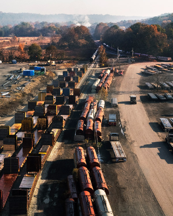 Image showing numerous train cars in a railroad yard.