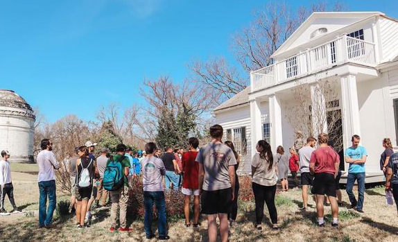 Students standing outside the Shirley House on the Vicksburg battlefield.